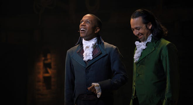 Aaron Burr (Leslie Odom Jr., left) and Alexander Hamilton (Lin-Manuel Miranda) are friends and rivals in "Hamilton."