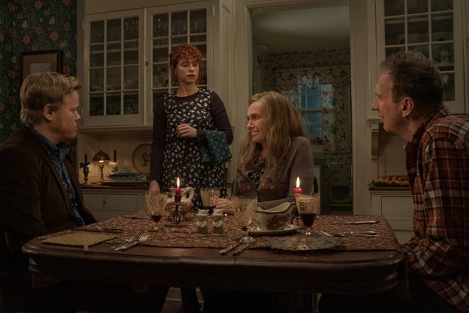 Jessie Buckley (standing) plays a young woman who has a very awkward dinner with her boyfriend (Jesse Plemons) and his parents (Toni Collette and David Thewlis) in "I'm Thinking of Ending Things."