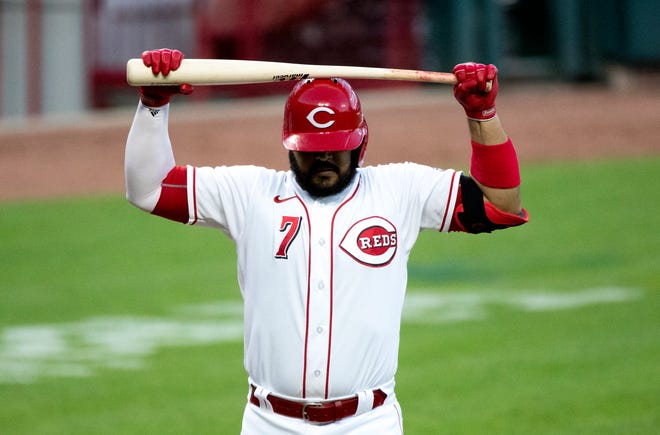 Cincinnati Reds third baseman Eugenio Suarez (7) reacts to striking out in the sixth inning of the MLB game between the Cincinnati Reds and Chicago Cubs at Great American Ball Park in Cincinnati on Tuesday, July 28, 2020.