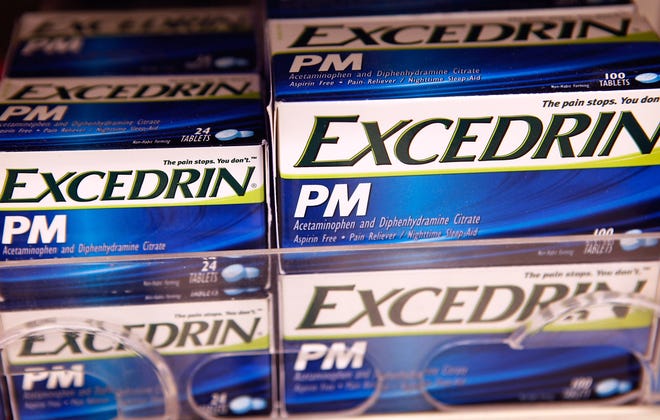 Excedrin PM is sold over-the-counter at a drugstore June 30, 2009 in Chicago, Illinois. More than 430,000 bottles of painkillers under the Excedrin brand have been recalled due to a manufacturing defect that may have left holes in the bottom of Excedrin bottles.