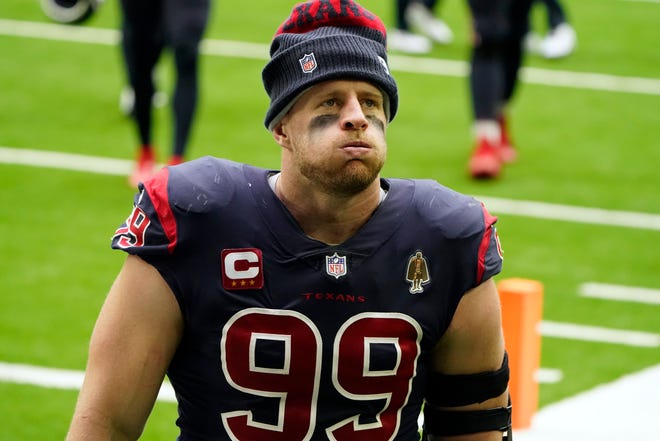 Houston Texans defensive end J.J. Watt leaves the field after a losing an NFL football game against the Cincinnati Bengals Sunday, Dec. 27, 2020, in Houston. The Bengals won 37-31.