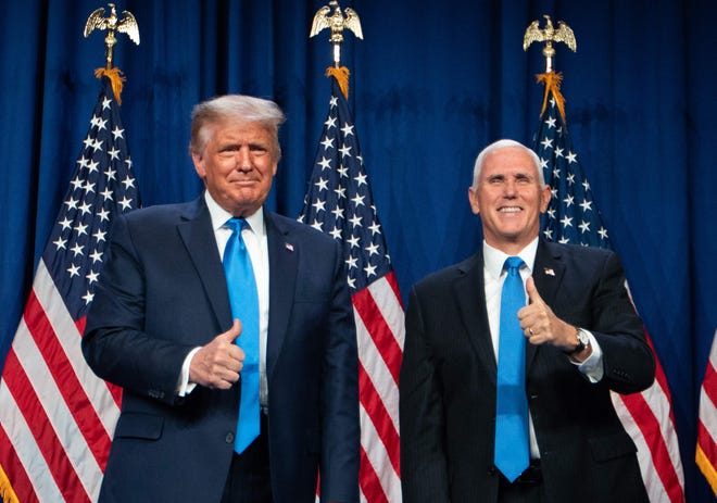 President Donald Trump and Vice President Mike Pence attend the first day of the Republican National Convention on Oct. 2, 2020.