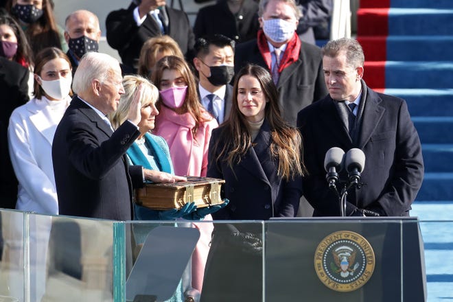 Joe Biden is sworn in as U.S. President during his inauguration on the West Front of the U.S. Capitol on January 20, 2021 in Washington, DC.  During today's inauguration ceremony Joe Biden becomes the 46th president of the United States.