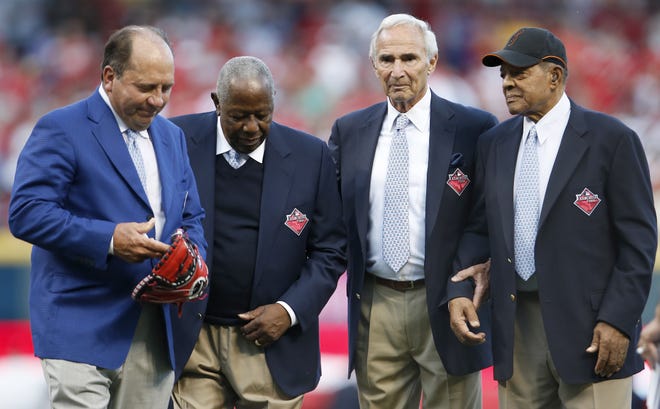 From left: Johnny Bench, Hank Aaron, Sandy Koufax and Willie Mays walk off the field after being honored as the greatest living baseball players prior to the 2015 MLB All-Star Game, Tuesday, July 14, 2015, at Great American Ball Park in Cincinnati.