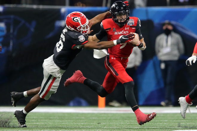 Quarterback Desmond Ridder and the Bearcats showed they were clearly the best of the Group of Five teams and were three seconds away from furthering their argument with a victory over SEC power Georgia.