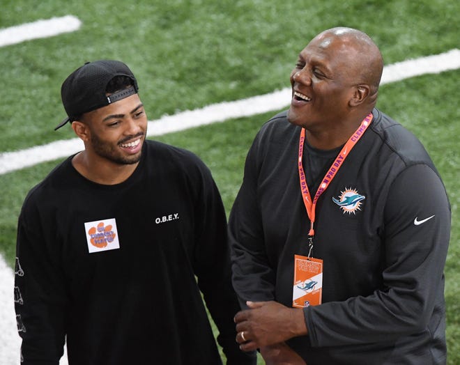 Marion Hobby visited with Darien Rencher during the Clemson Pro Day in 2019. Hobby, who previously coached for Clemson, has spent the past two seasons with the Miami Dolphins.