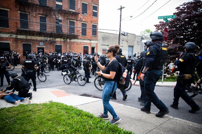 Enquirer reporter Madeline Mitchell covers the protest in Cincinnati in June 2020 following the death of George Floyd in Minneapolis.