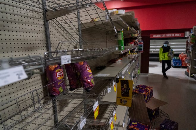 Snack shelves are seen nearly empty in Fiesta supermarket on Feb. 16, 2021 in Houston, Texas. Winter storm Uri has brought historic cold weather, power outages and traffic accidents to Texas as storms have swept across 26 states with a mix of freezing temperatures and precipitation.