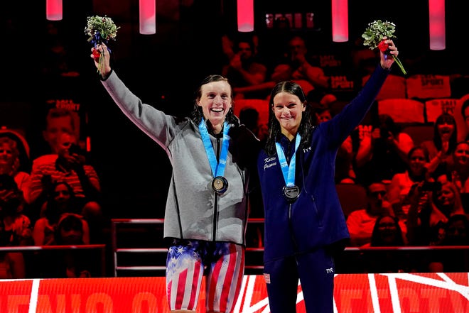 Katie Ledecky (left) and Katie Grimes celebrate during the medal ceremony for the women's 800 freestyle during the U.S. Olympic Team Trials in Omaha.