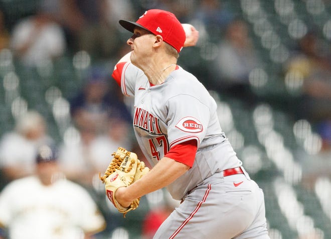 Jun 15, 2021; Milwaukee, Wisconsin, USA;  Cincinnati Reds pitcher Brad Brach (47) throws a pitch during the eighth inning against the Milwaukee Brewers at American Family Field. Mandatory Credit: Jeff Hanisch-USA TODAY Sports