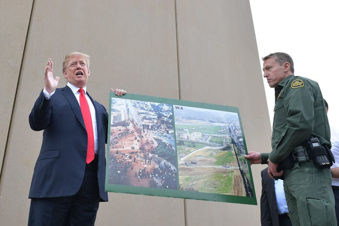 President Donald Trump and Border Patrol chief Rodney Scott.