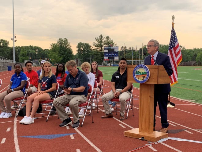 Gov. Mike DeWine encourages high school and middle school student athletes to get vaccinated against COVID-19. He held a press conference June 18, 2021 at Thomas Worthington High School's track.