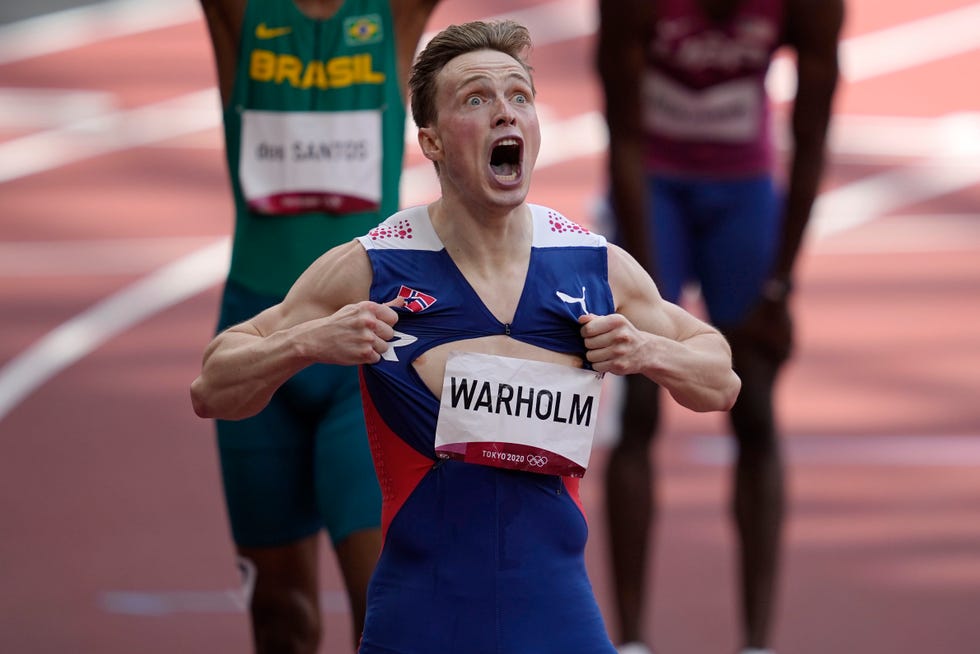  Karsten Warholm (NOR) reacts after winning the men's 400m hurdles during the Tokyo 2020 Olympic Summer Games at Olympic Stadium. 