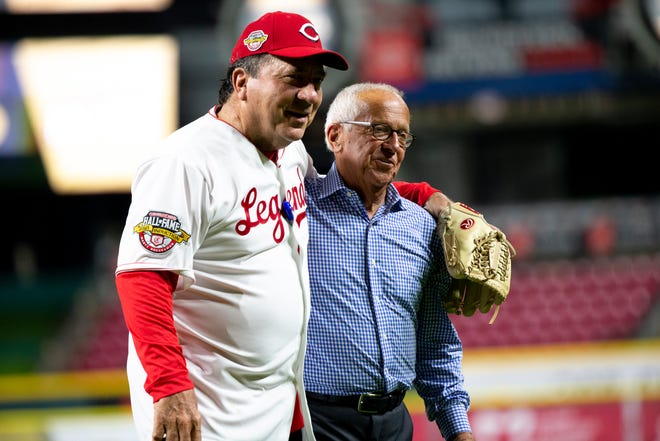 Former Reds player Johnny Bench walks back to the dugout with Marty Brennaman before the Reds Legends softball game between Team Bench and Team Larkin involving former Reds players as part of the 2021 Reds Hall of Fame induction ceremony for Marty Brennaman on Friday, Aug. 27, 2021, at Great American Ball Park in Cincinnati.