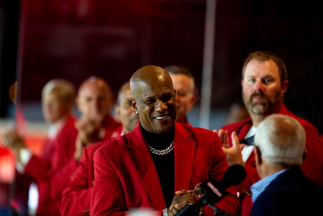 Reds Hall of Famer Eric Davis claps during the 2021 Reds Hall of Fame induction ceremony for Marty Brennaman on Friday, Aug. 27, 2021, at Great American Ball Park in Cincinnati. 