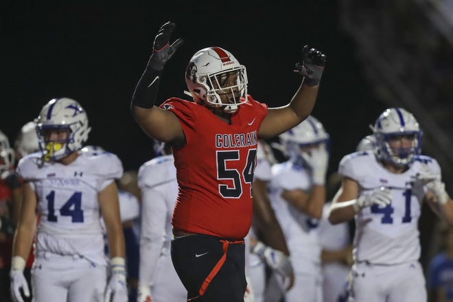 Colerain offensive lineman Anthony Tate (54) celebrates after a touchdown in the second half of the game against St. Xavier Bombers at home Aug. 27, 2021.