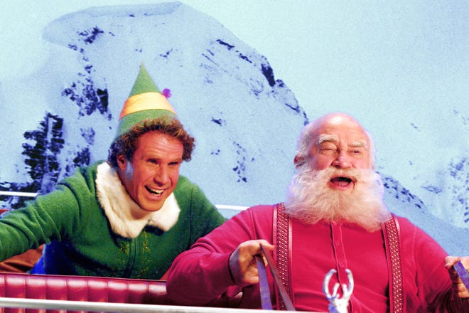 Ed Asner, right, played Santa opposite Will Ferrell's Buddy in 2003's "Elf."