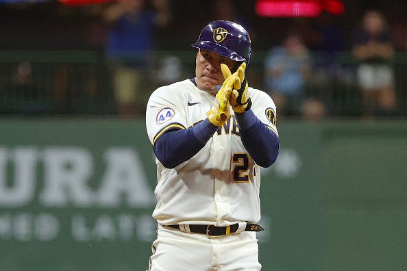 Avisail Garcia of the Milwaukee Brewers reacts to a base hit double during the fourth inning against the Cincinnati Reds at American Family Field on August 25, 2021 in Milwaukee, Wisconsin.