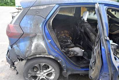 In this file image released by the Vermont State Police  taken on July 2, 2021, a 2019 Chevrolet Bolt EV is seen after it caught fire on July 1, 2021 in Thetford, Vermont.  General Motors announced July 23, 2021 a second recall of the all-electric Chevrolet Bolt to address a battery defect blamed for recent car fires.