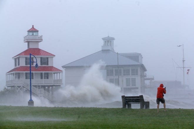 Waves crash against the New Canal Lighthouse on Lake Pontchartrain as Hurricane Ida approaches New Orleans on Aug. 29, 2021.