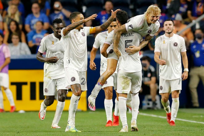 Inter Miami CF midfielder Brek Shea (20) is lifted up after scoring the game-winning goal in the final minute of the second half of the MLS match between FC Cincinnati and Inter Miami CF at TQL Stadium in the West End neighborhood of Cincinnati on Saturday, Sept. 4, 2021. Inter Miami CF won, 1-0, on a goal in the 90th minute.