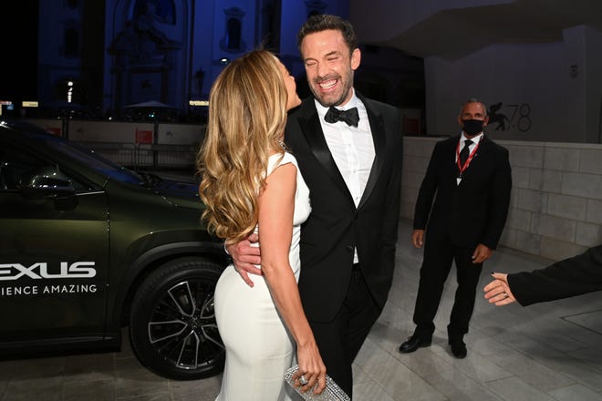 Jennifer Lopez and Ben Affleck are all smiled on the red carpet at the Venice Film Festival on Sept. 10, 2021 in Venice, Italy.