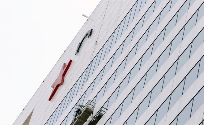 The Macy's signage was removed from the headquarters on Seventh Street in downtown Cincinnati Friday, September 10, 2021.