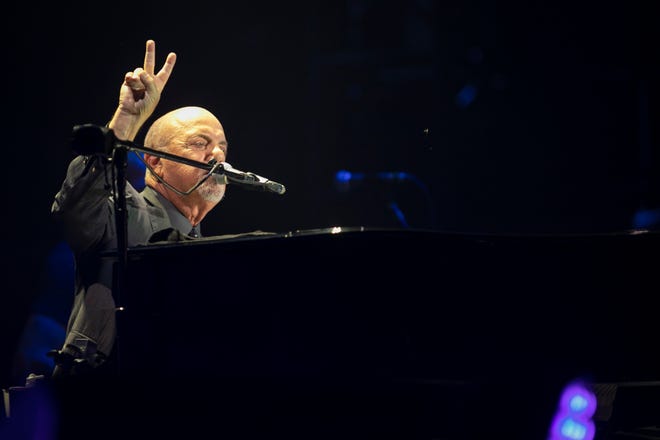 Billy Joel sings to a sold-out crowd of 36,395 at Great American Ball Park, on Friday, September 10. 