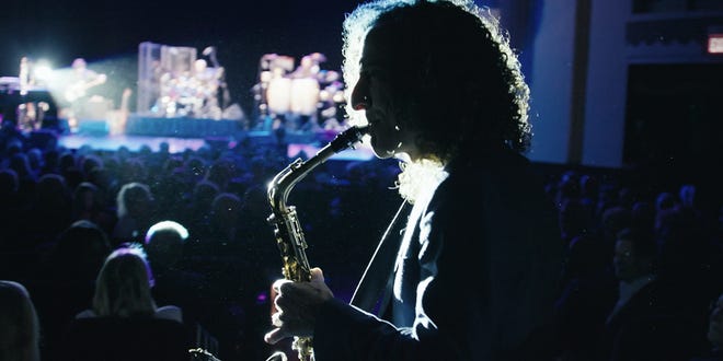 Kenny G pulls out his alto sax for a change in the new HBO documentary "Listening to Kenny G."