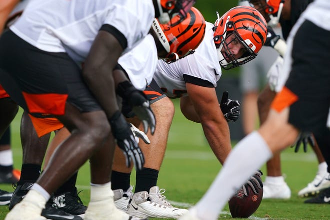 Cincinnati Bengals center Billy Price (53) looks down the offensive line during training camp practice, Monday, Aug. 16, 2021, at the practice fields next to Paul Brown Stadium in Cincinnati.