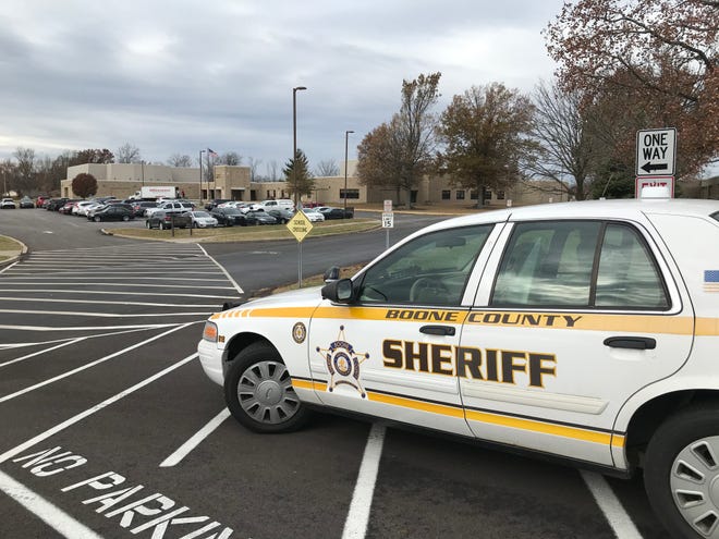 On Nov. 21, 2019, a Boone County Sheriff car parked near the entrance to the campus of Ockerman Middle School in Florence, Kentucky, a day after a 13-year-old student was arrested on a felony terroristic threatening charge. Police said the boy reportedly threatened to shoot three eighth grade girls and seventh-grade students in general. Nationwide, roughly a quarter of law enforcement referrals lead to arrests, federal data shows.