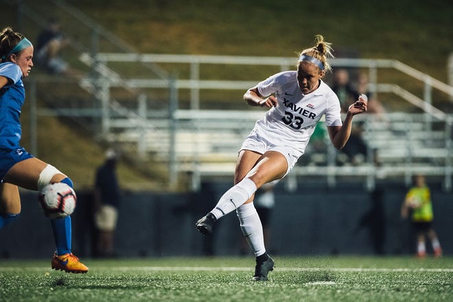 Xavier University women's soccer player Rachel Butler (33) recently decided to end her college soccer career after concussion issues. She's since joined the cross country team and won her first-ever meet on Sept. 3, 2021.