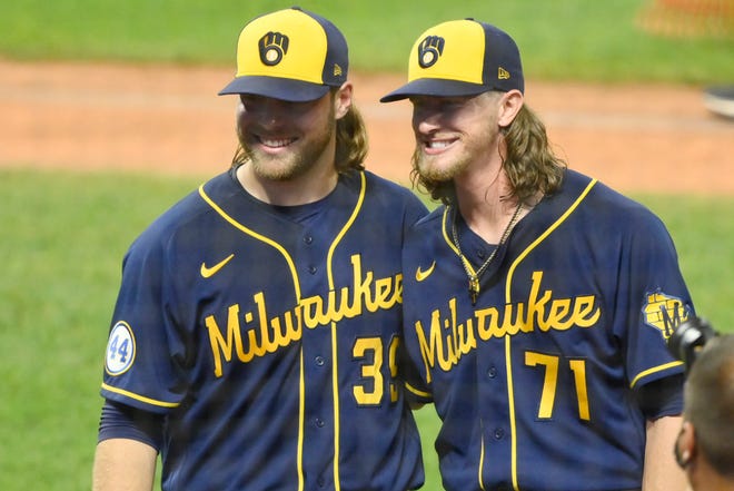 Milwaukee Brewers starting pitcher Corbin Burnes and relief pitcher Josh Hader pose for a picture after they threw a combined no-hitter in a win against Cleveland at Progressive Field.