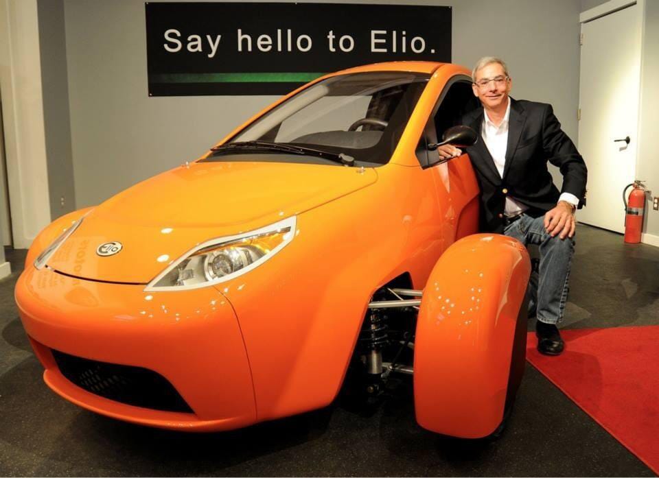 Paul Elio poses with his three-wheel vehicle, the Elio, which he intends to build in Shreveport.