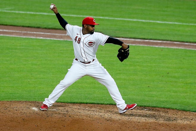 Cincinnati Reds relief pitcher Mychal Givens (48) delivers a pitch in the top of the ninth inning of the MLB National League game between the Cincinnati Reds and the Pittsburgh Pirates at Great American Ball Park in downtown Cincinnati on Thursday, Aug. 5, 2021. The Reds led 7-4 in the seventh inning. 