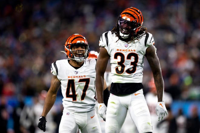 Cincinnati Bengals cornerback Tre Flowers (33) celebrates after making a tackle on special teams during an NFL divisional playoff football game, Saturday, Jan. 22, 2022, at Nissan Stadium in Nashville, Tenn. Cincinnati Bengals defeated Tennessee Titans 19-16.