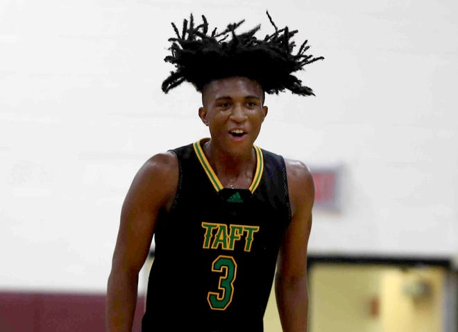 Taft guard Rayvon Griffin reacts during their basketball game against Western Hills, Friday, Dec. 17, 2021.