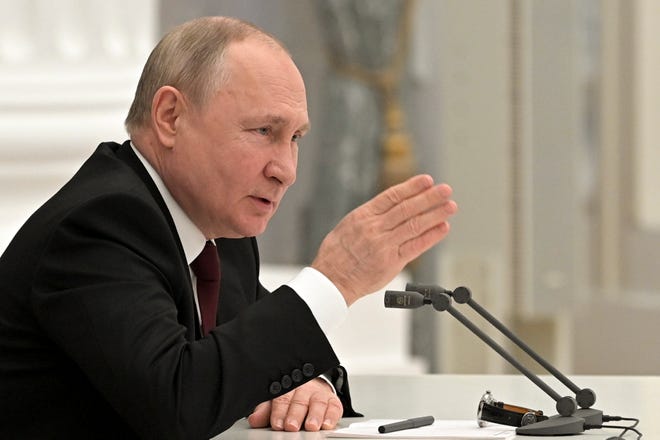 Russian President Vladimir Putin talks Monday in Moscow.